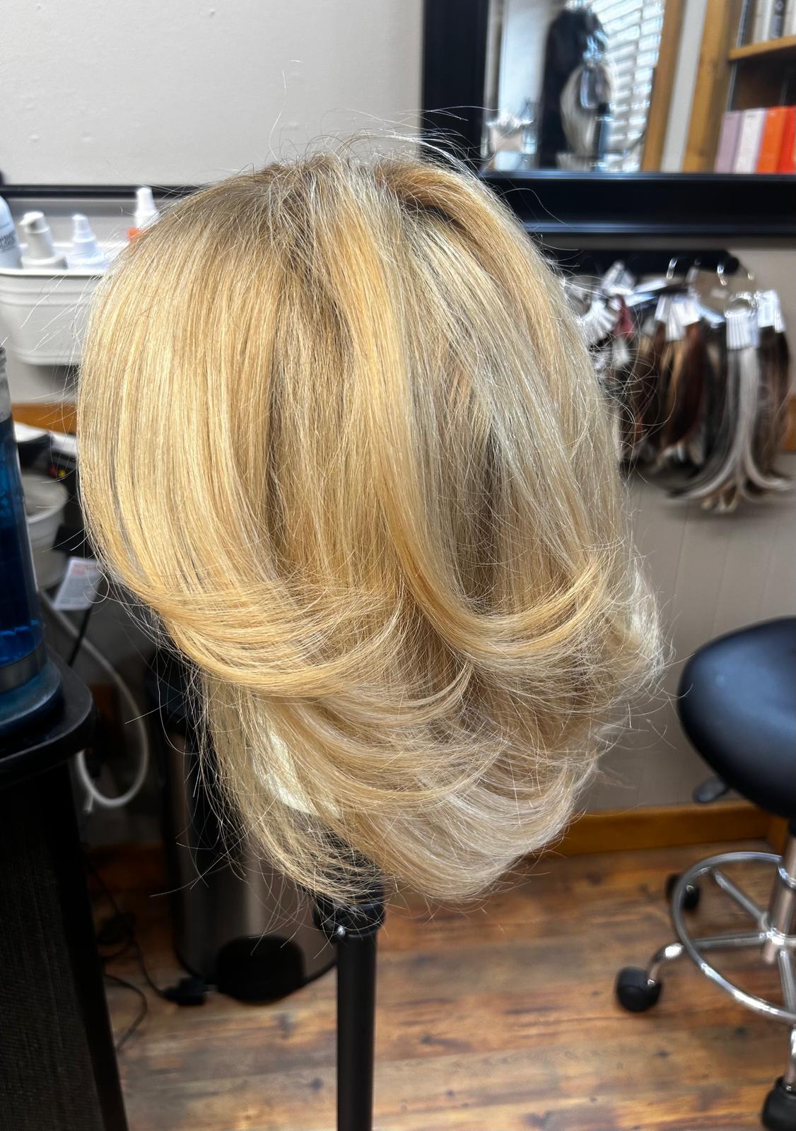 Wig after — washed, styled with volume and bounce